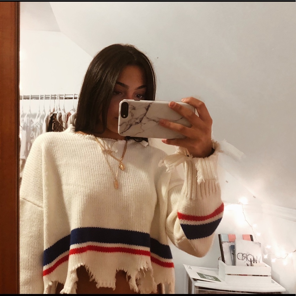 Distressed cropped sweater